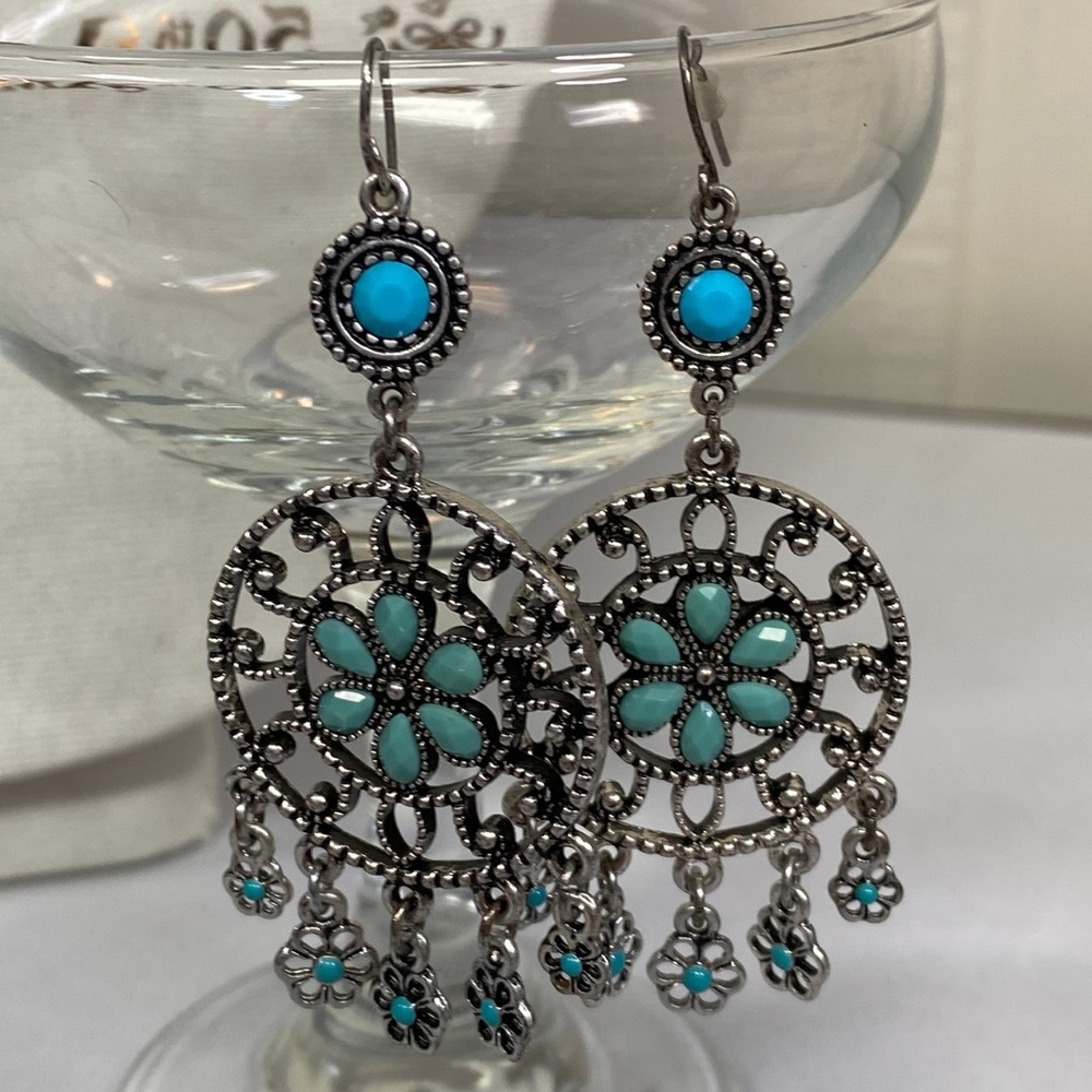 Southwest style silvertone scrollwork blue earrings